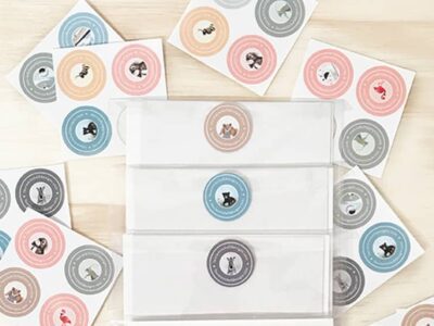 Stylish face masks with animal icons and matching stickers in pastel colors.