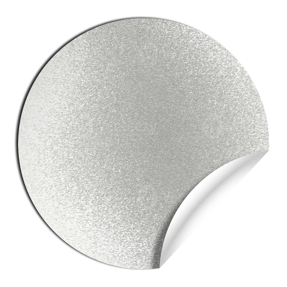 A shiny silver sticker with a curled edge.